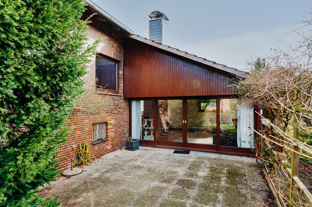 Festpreis - Großes Grundstück, Feldblick & Kamin – Einfamilienhaus in Scharnebeck! - Terrassenbereich