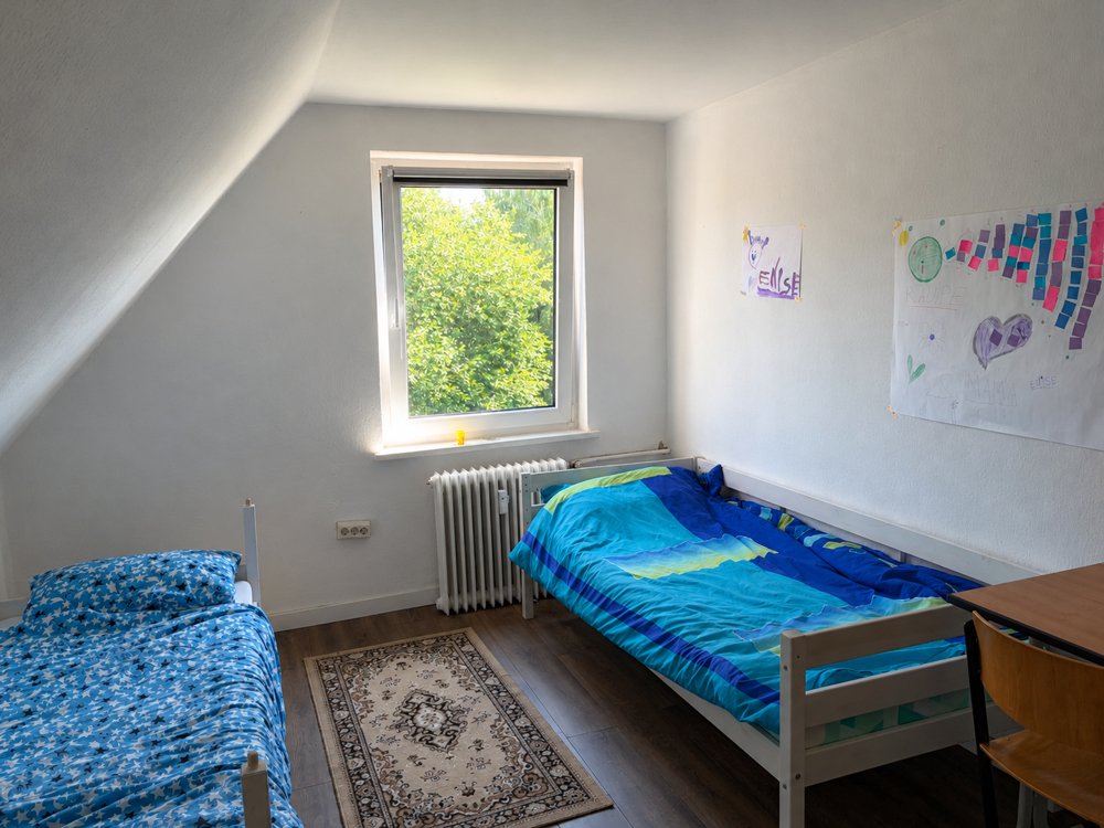 Vollvermietete Kapitalanlage in zentraler Lage von Dahlenburg - Schlafzimmer im Dachgeschoss