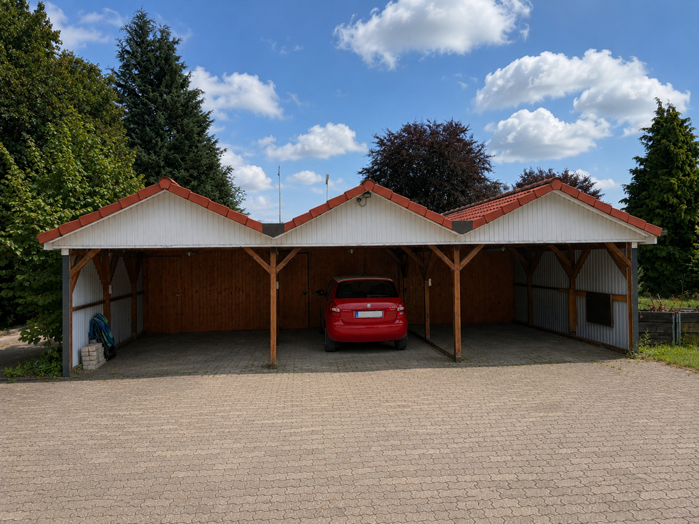 Attraktives Mehrfamilienhaus mit stabilem Mietertrag in Lüdersburg - Carports